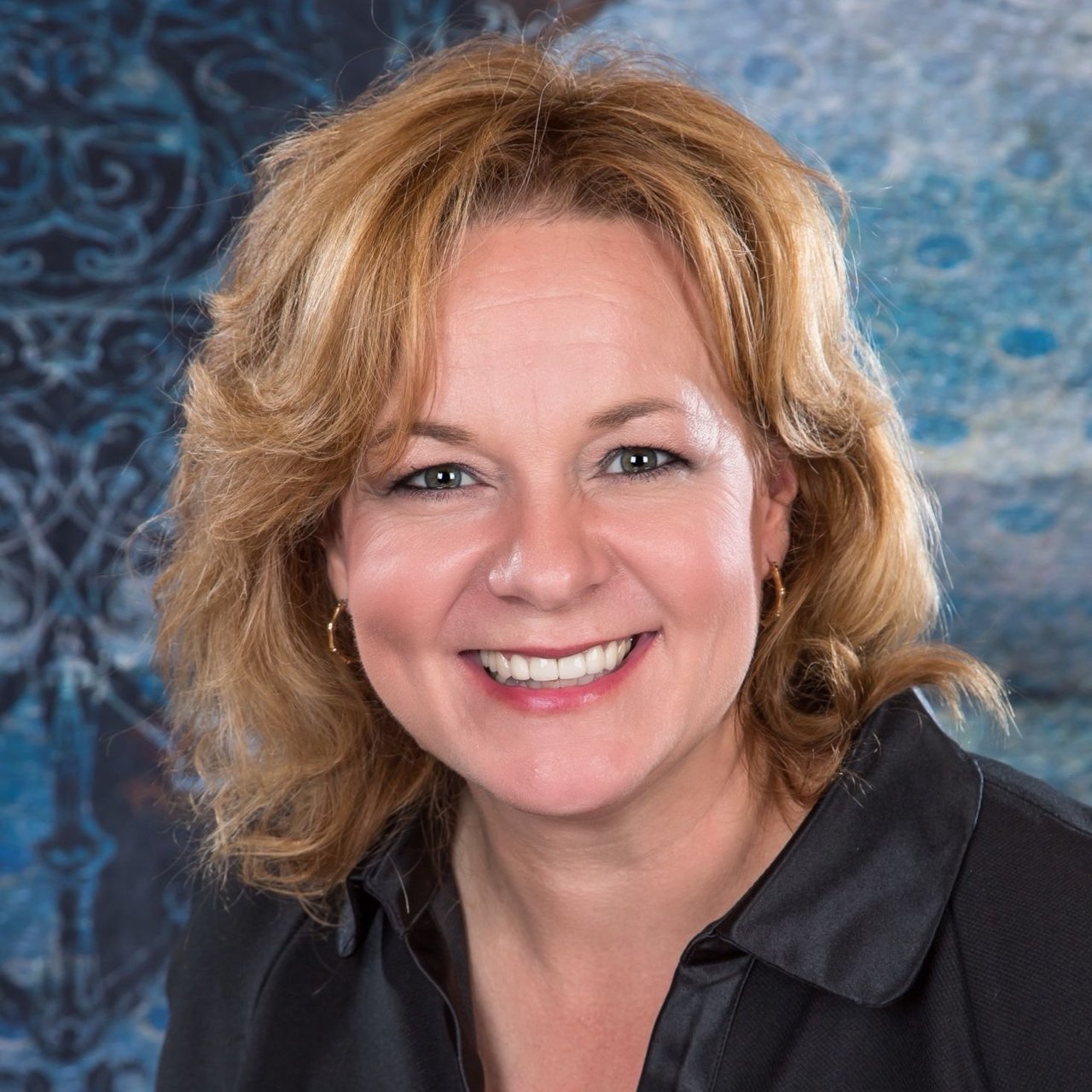 Kelly Cooper Minocqua, WI Real Estate Agent Headshot