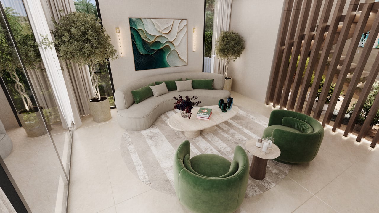 Living room with a curved cream sofa, green velvet chairs, abstract art, and floor-to-ceiling windows.
