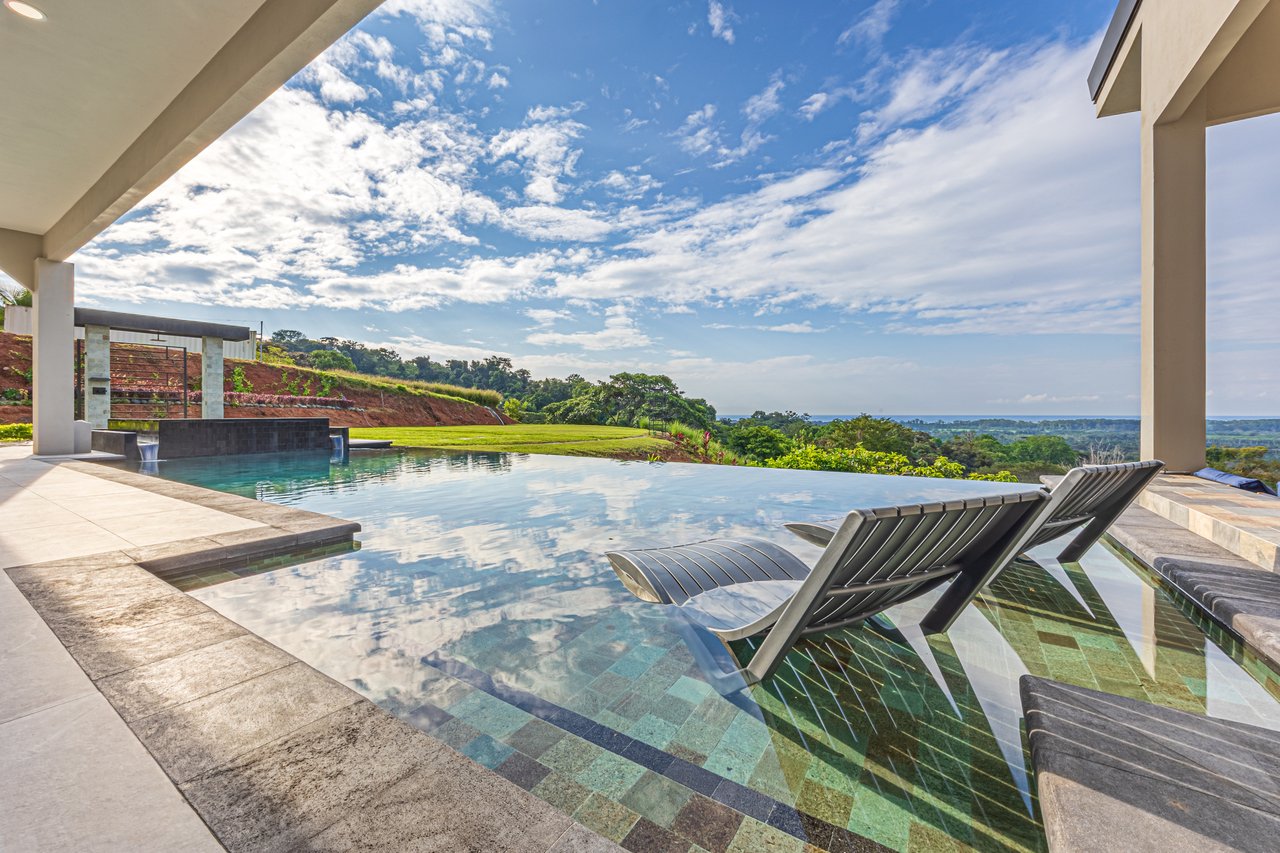 4 ACRES – 3 Bedroom Home “The Crystal Shire” With Wide Ocean View, Creek, Solar Power, Fine Craftsmanship, Self Sufficiency!!