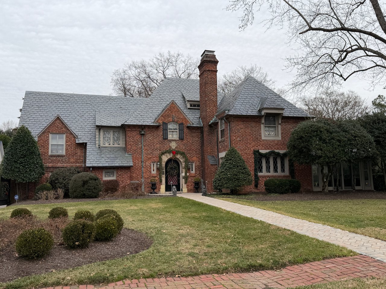 Windsor Farms Richmond classic brick home with arched door