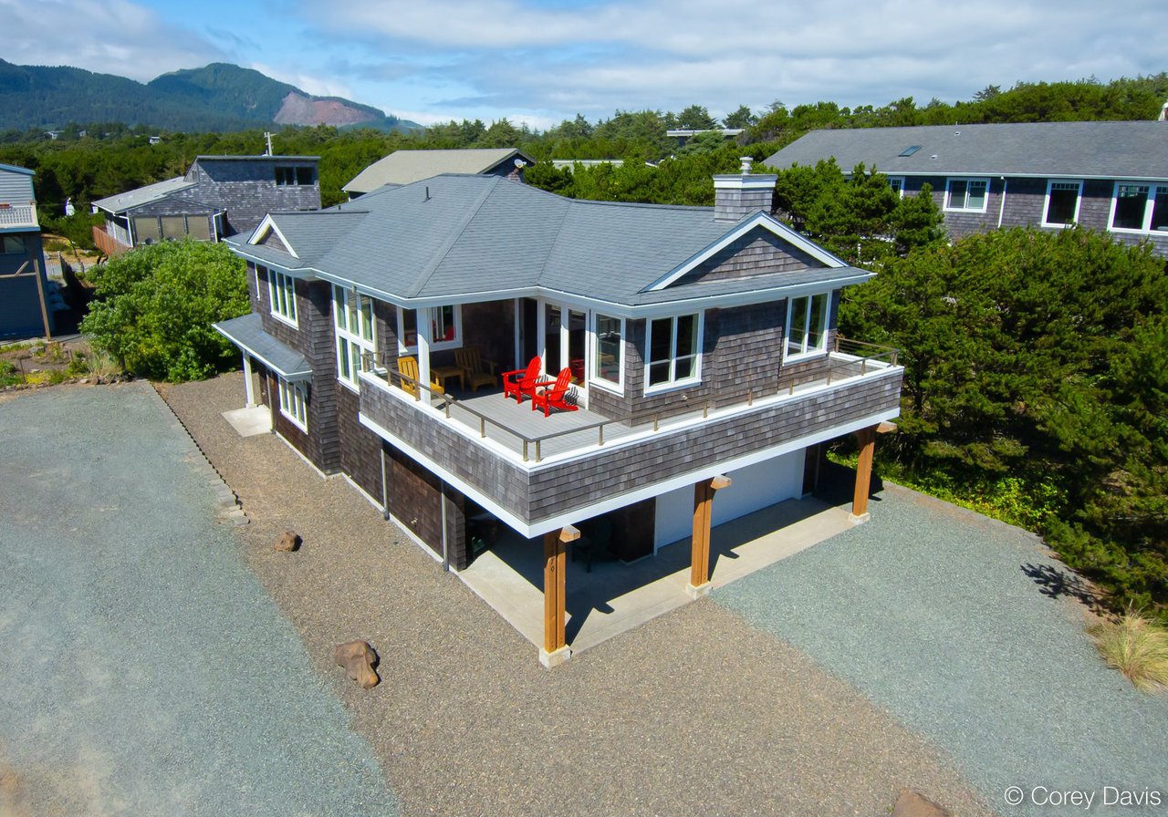 Sold custom Manzanita beach home at 8870 Spindrift Ln represented by Meadow Davis of Home + Sea Realty with ocean and Neahkahnie views
