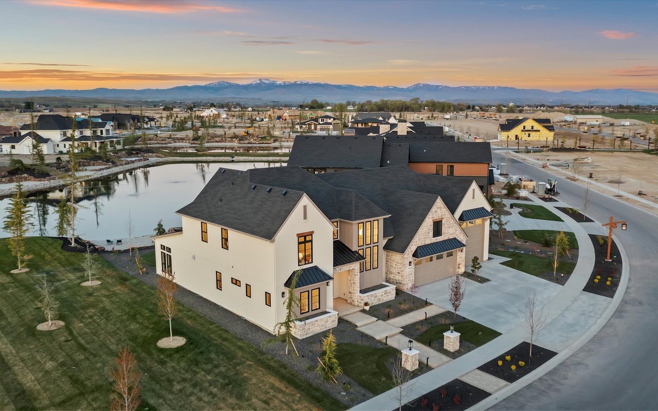 Southwest aerial view looking past the home towards the Boise mountains