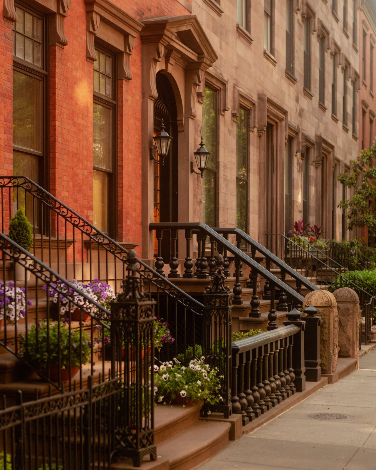 Historic brownstones and limestone townhouses along 8th Avenue in Park Slope, Brooklyn