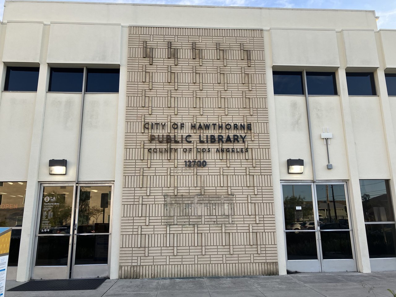 Hawthorne Library entrance at 12700 Grevillea Avenue, photographed in January 2024