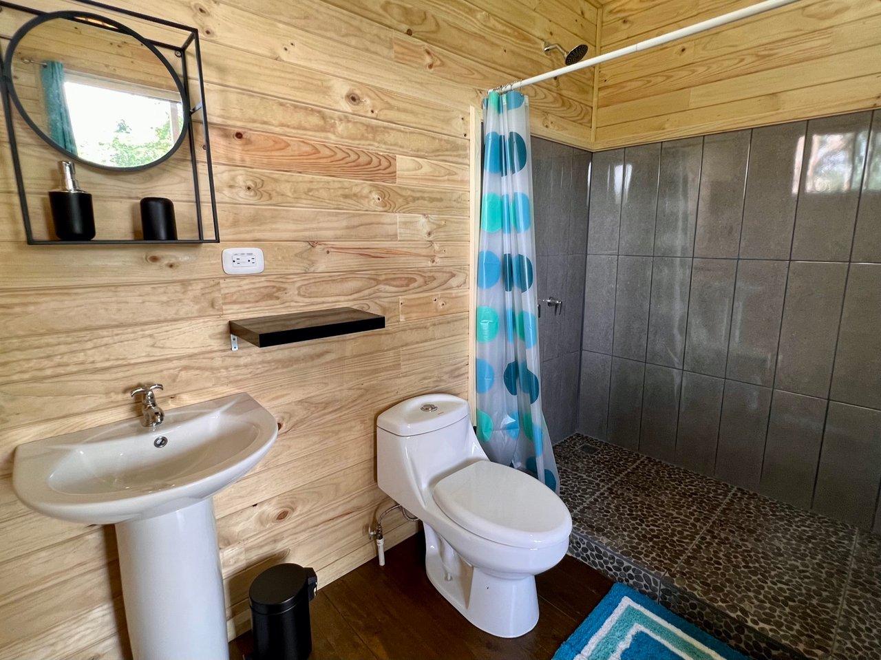 Eco-Luxury Home and Cabins with Waterfall, Ocean Views, and Organic Farming Potential
