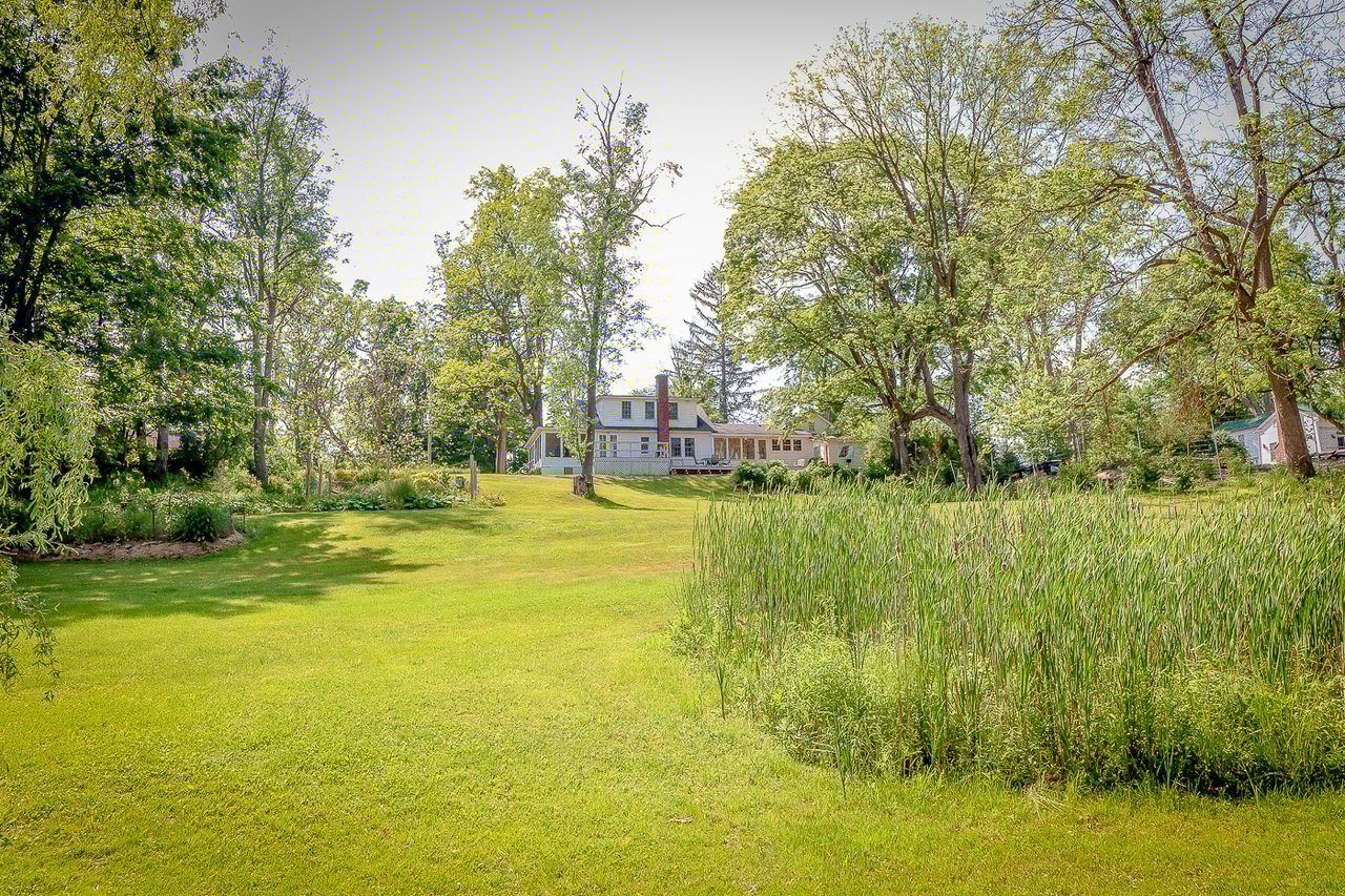 A House in Columbia County with beautiful gardens. 