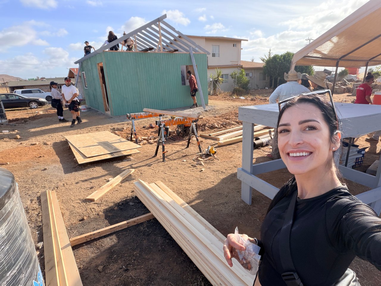 Jade showcasing the build progress at the end of Day One.