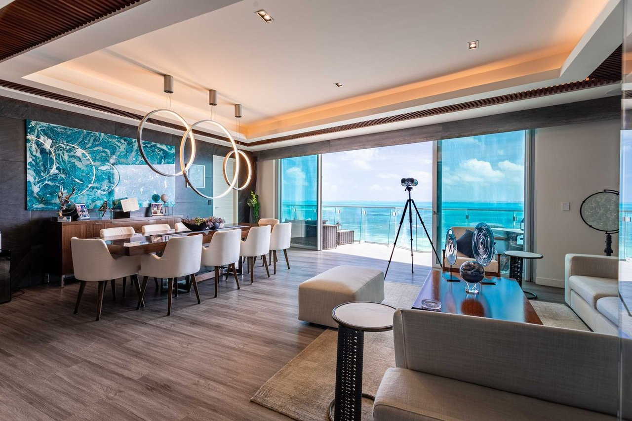 LUXURIOUS and STUNNING apartment featuring OCEAN VIEWS from the living room, primary bedroom, and terrace, with BEACHFRONT access in Cancun's most upscale area