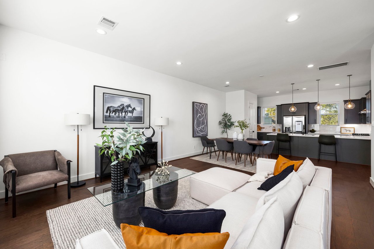 model living room with gold accent pillows 