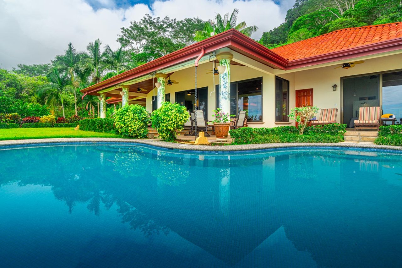 Ocean, jungle & mountain views on a meticulously landscaped 3-home family compound