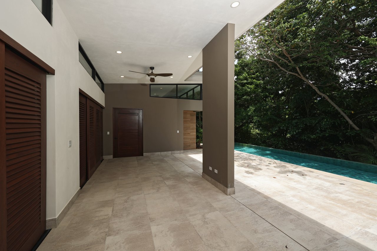 Modern luxury home for sale in Pacífico, Playas del Coco – Private pool, beach club and resort amenities