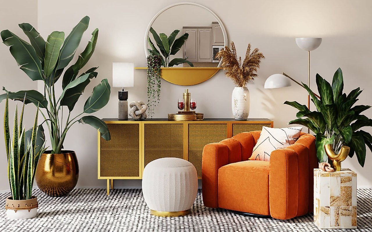 Boho-chic living room interior showcasing a channel-tufted rust orange accent chair, a cane-door sideboard, large banana leaf plants, a white pouf, and mid-century lighting.