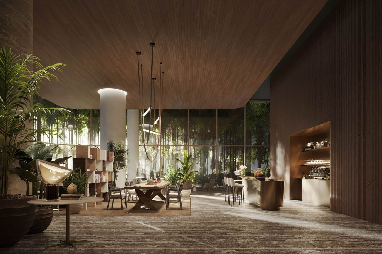 1428 Residences lobby lounge with indoor plants, floor-to-ceiling windows, and a built-in bar