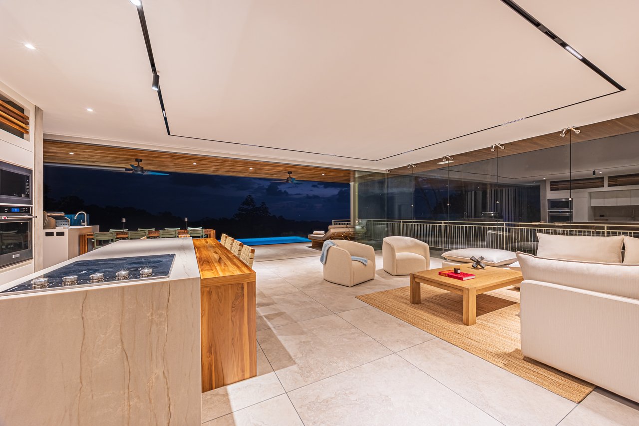 New contemporary tropical villa boasts with a movie theater and views of the iconic whale’s tail