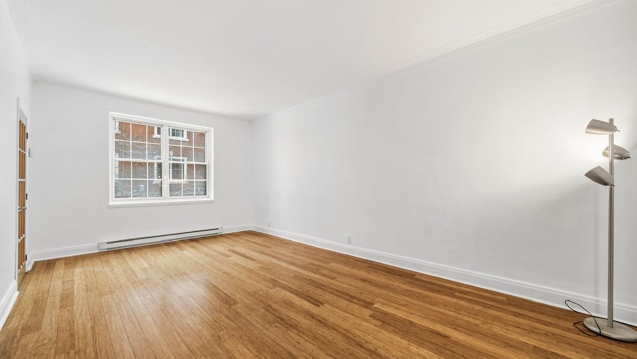 At the edge of Westmount | Corner unit with a view of Mount Royal