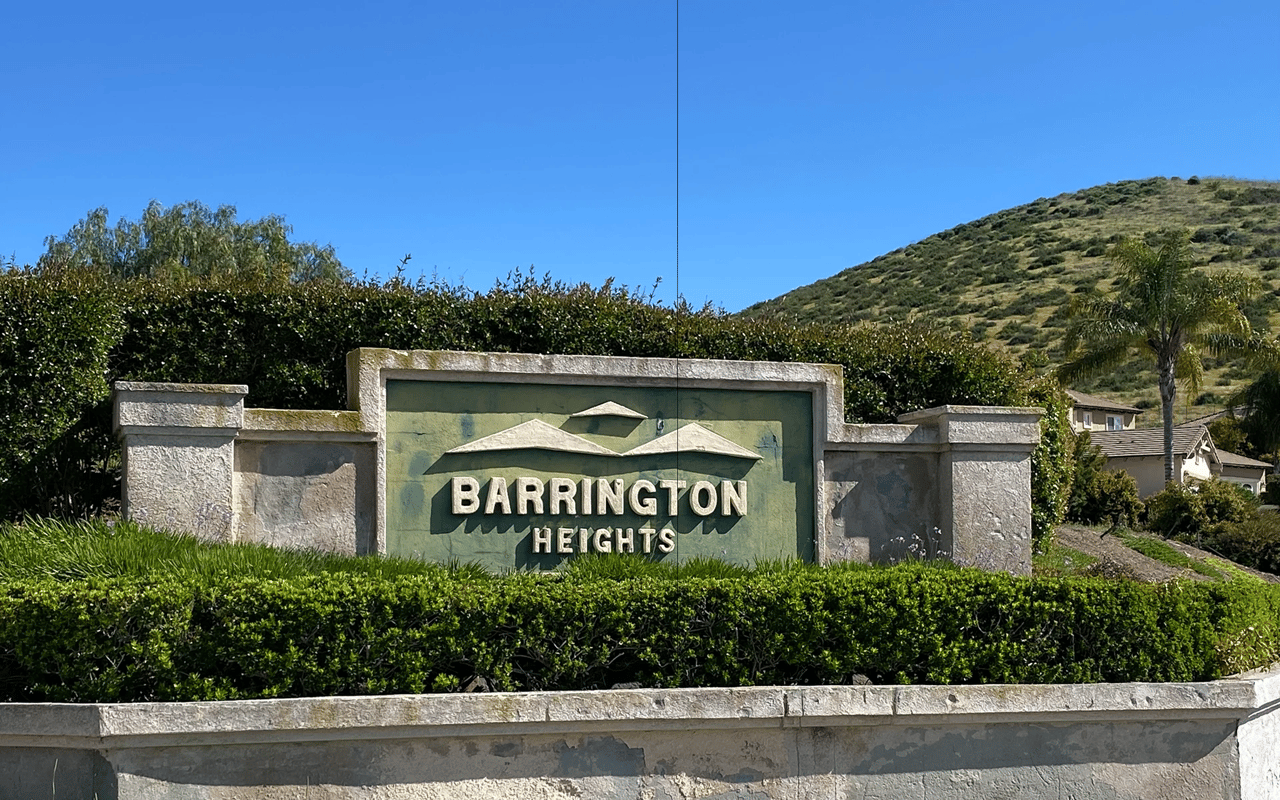The landscaped monument sign at the entrance to the Barrington Heights neighborhood in Menifee, California.