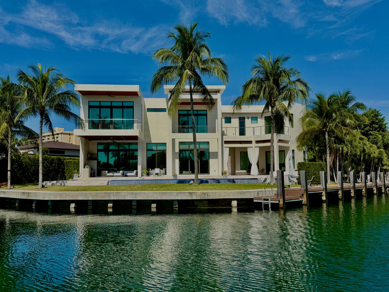 Newly completed modern luxury waterfront estate and updated dock in Keystone Islands, North Miami