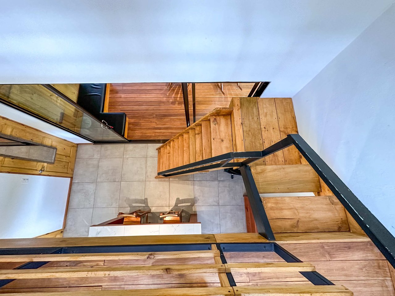 A 1-bedroom loft PERFECT for a couple or an Airbnb rental – plus a HUGE jungle backyard with a year-round river and many magical swimming holes – and a lot of flat land for further development!