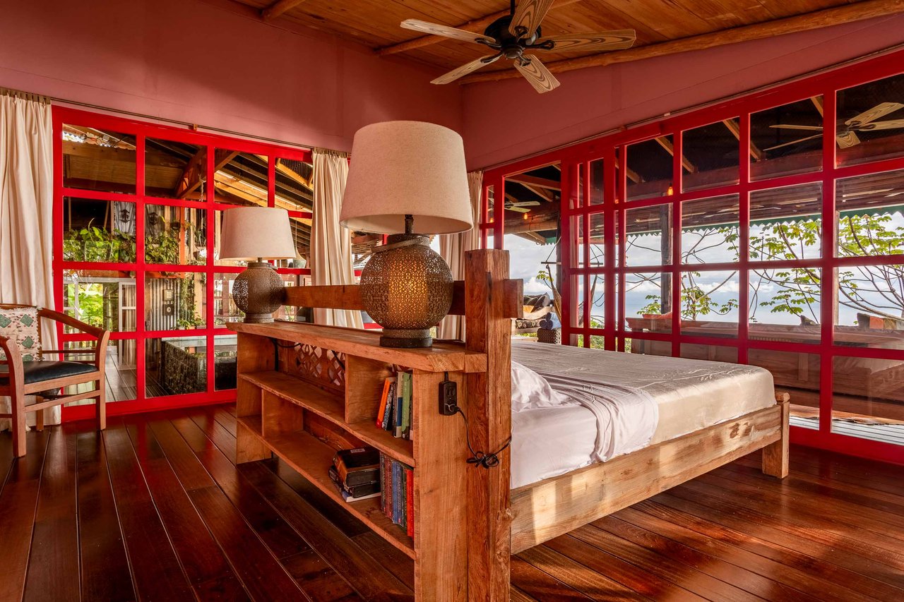 A Handcrafted Residence Immersed in Nature Above the Canopy Ocean View Architectural Home