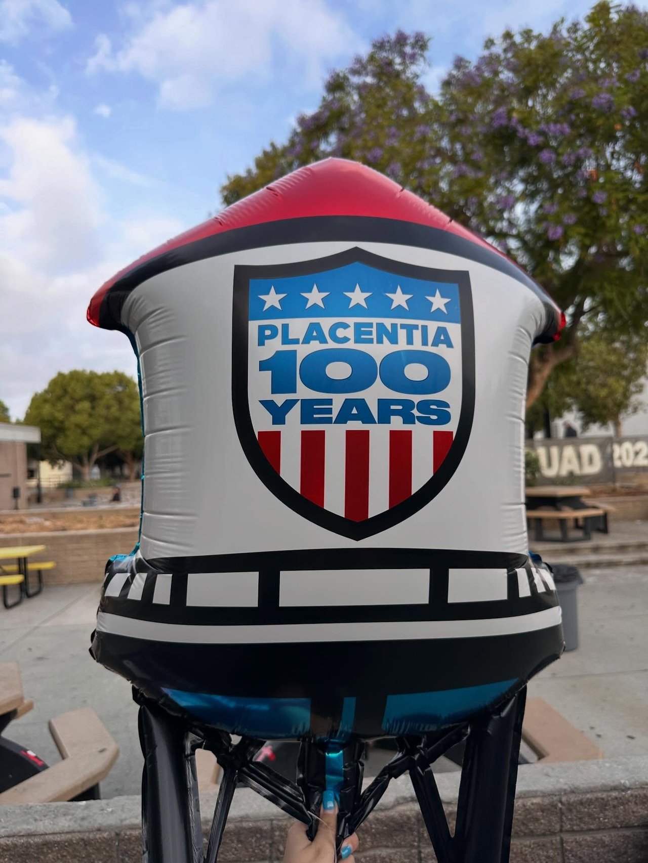 Inflatable Placentia 100 Years anniversary display in an outdoor plaza.