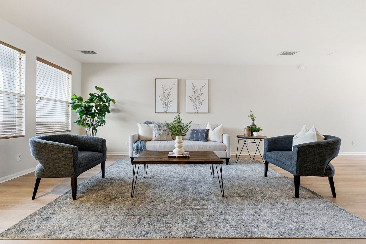 Open-concept living room with natural light in First Creek Denver townhouse