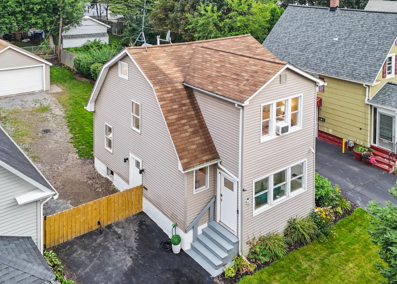 Modern North Winton Village Colonial With 2 Car Garage
