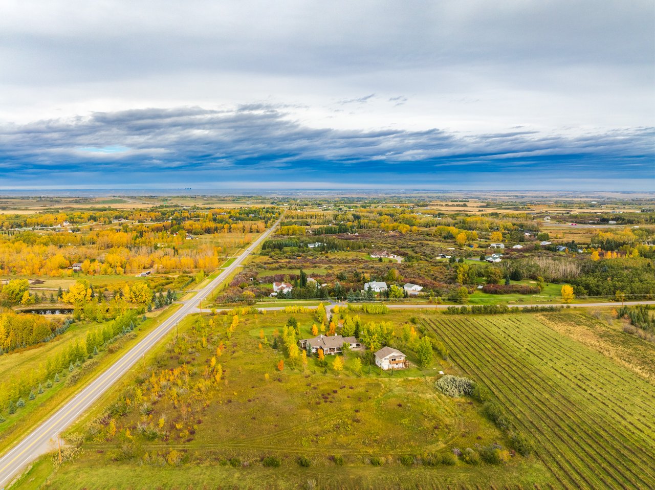 Peace, Profit & Possibility: 6 Acres with a Legal Suite Minutes from Okotoks