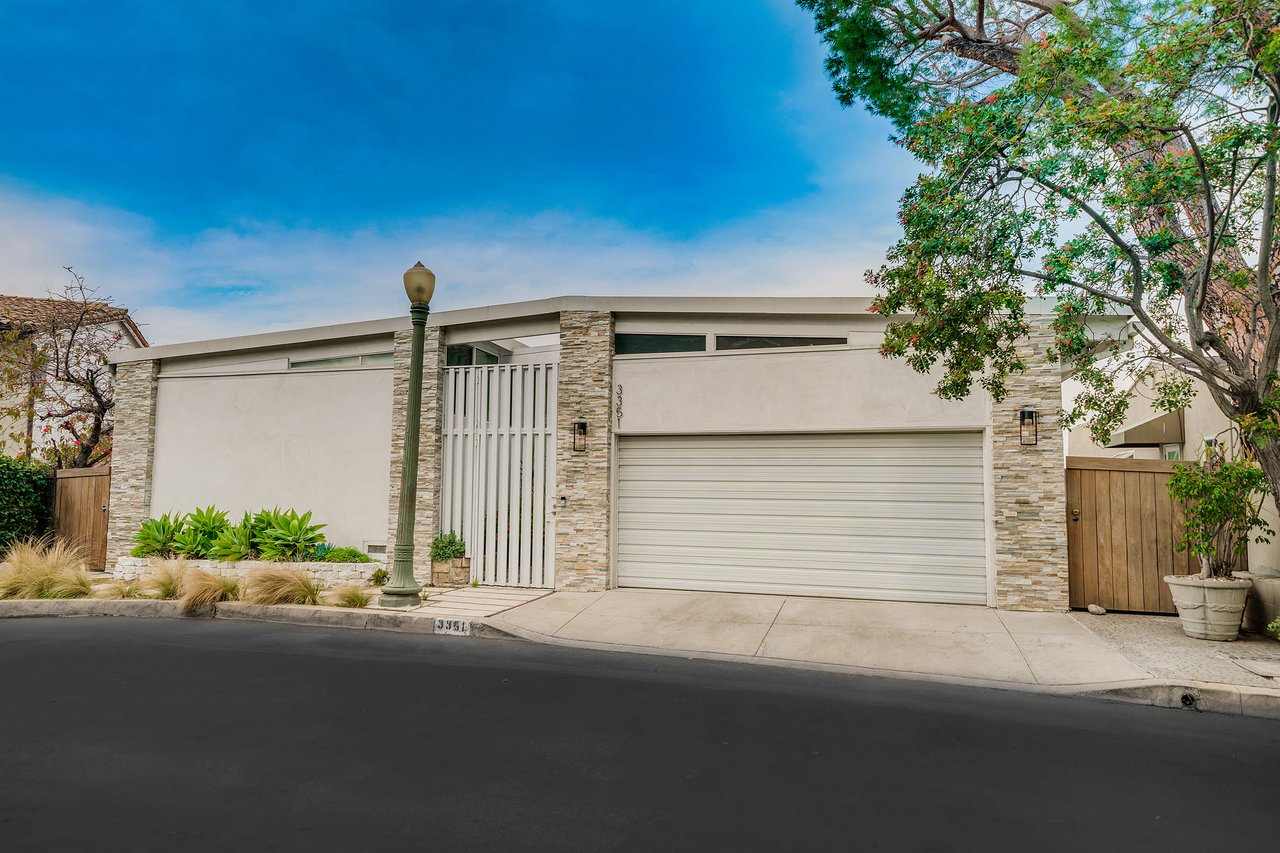 Mid Century with Potential in Lovely Lake Hollywood