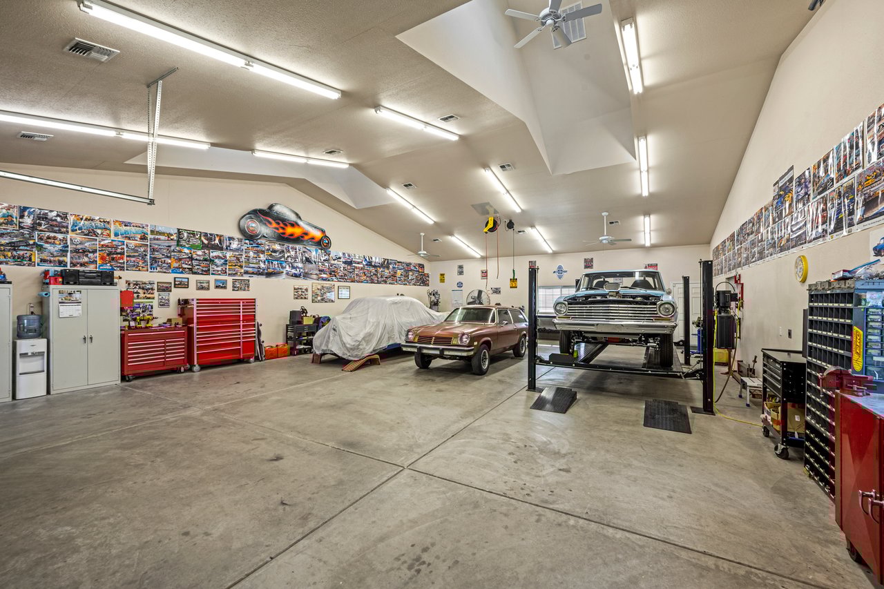 Custom Built Home on 4 Flat Acres in the Heart of Pleasant Valley – A Car Enthusiast's Dream!