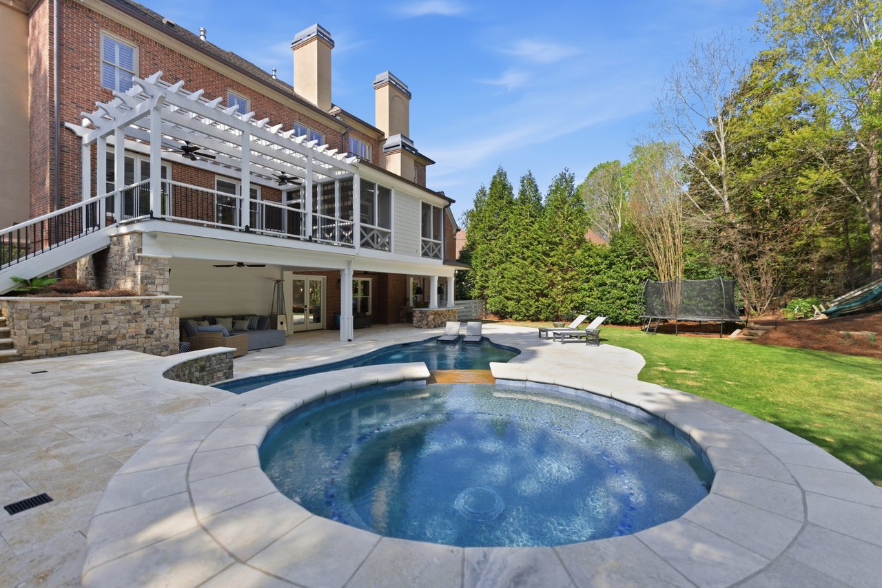 East Cobb home with private pool, outdoor kitchen, and covered patio ideal for entertaining