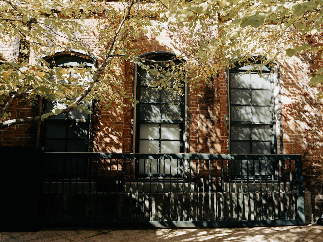 Historic brownstones, townhouses, and multifamily homes along Gates Avenue in Bedford-Stuyvesant, Brooklyn.