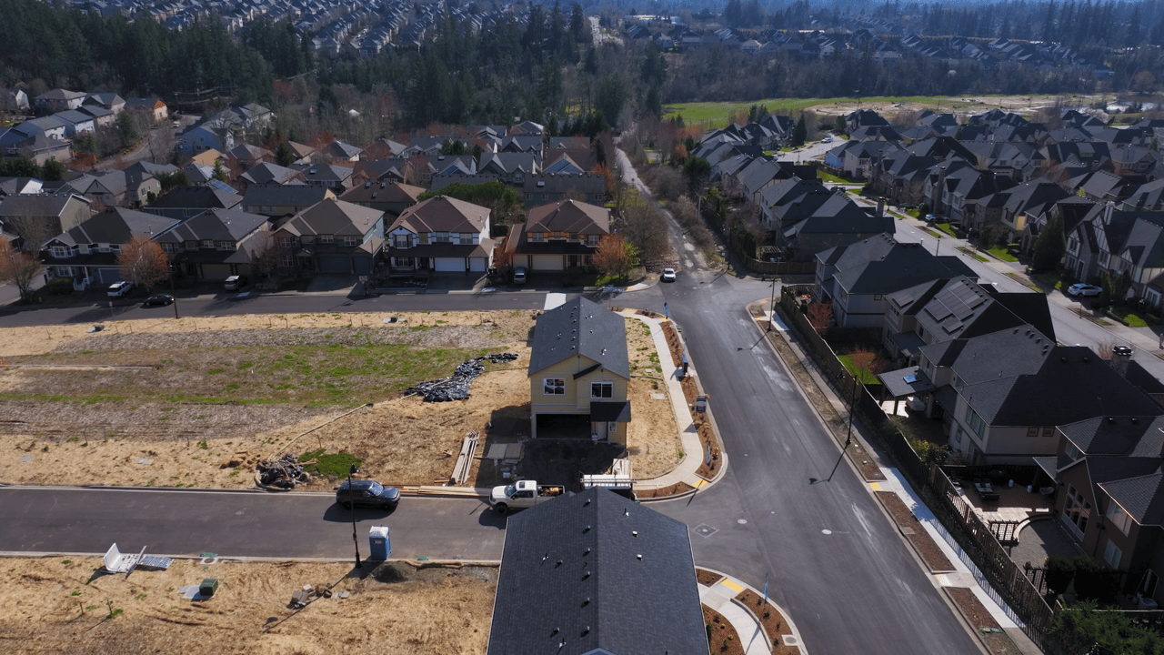 Aerial view of Deer Fern Ridge community in Bethany, Oregon, showcasing new construction homes by Riverside Homes in a prime suburban location near top-rated schools and major employers like Intel and Nike.