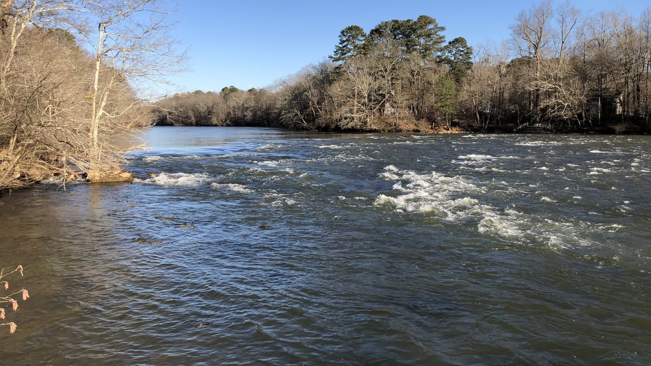 Chattahoochee River rapids in Johns Creek, Georgia, on a clear winter day