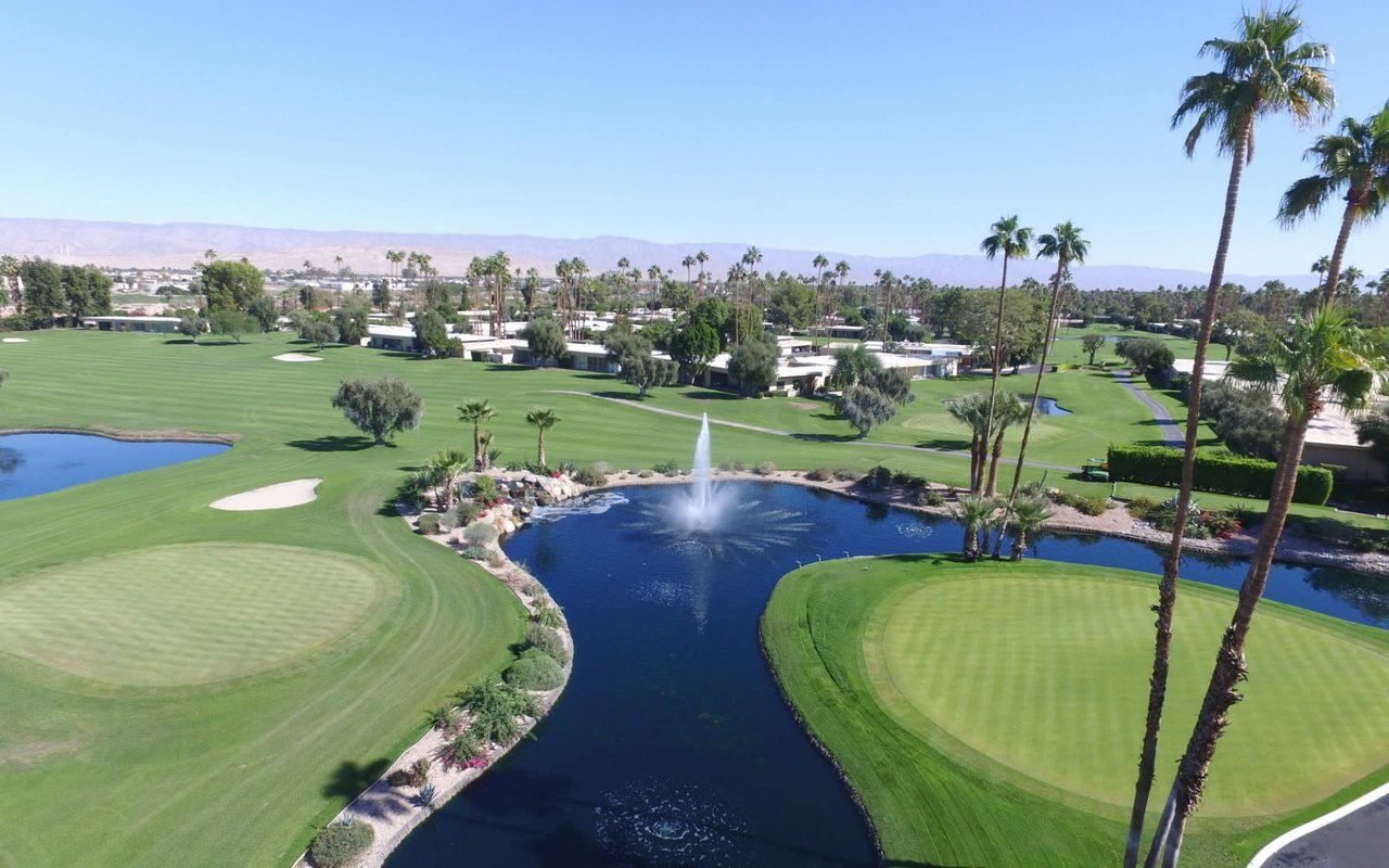 An aerial view of a golf course at Seven Lakes Country Club in Palm Springs, California.