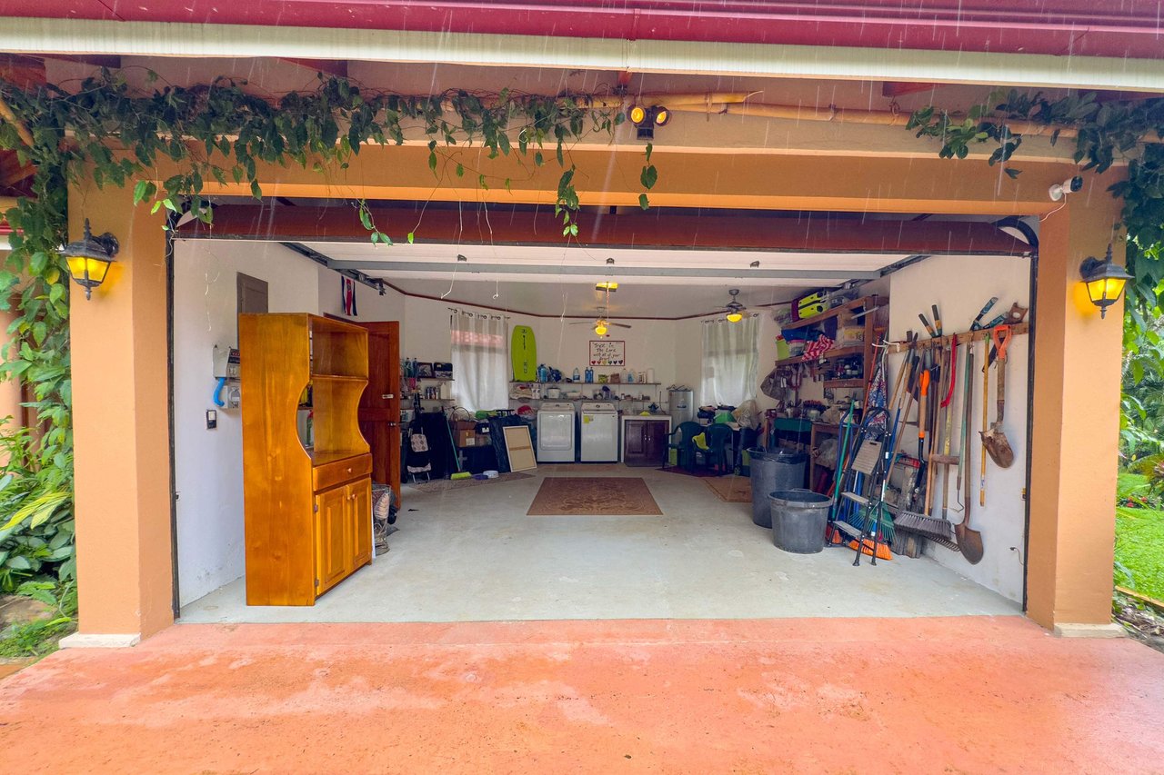 Stunning Tropical Home in Gated community with Hundreds of fruit trees  