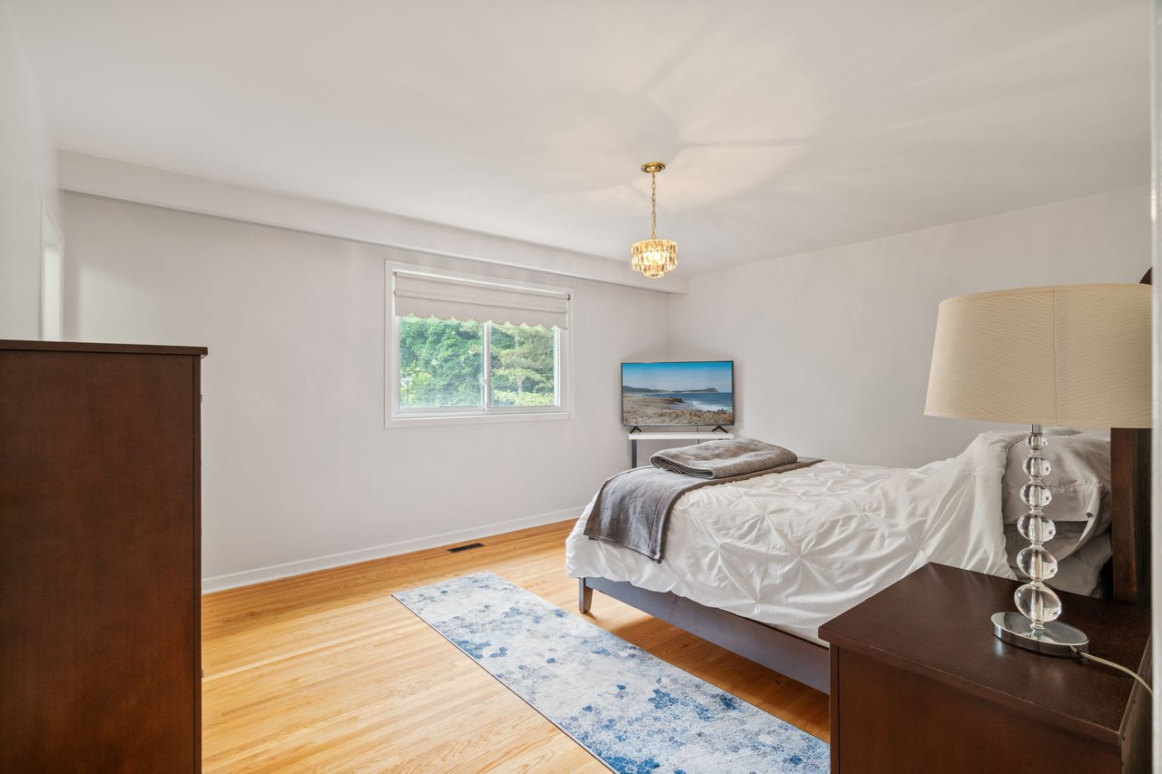 SOLD: Coveted Bayview Woods