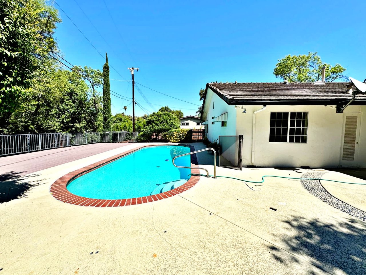 Pool Home In A Highly Sought-After Pocket of Woodland Hills