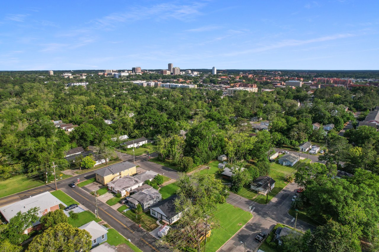 An aerial view of Frenchtown, showing the broader perspective of the residential area, including houses and streets.