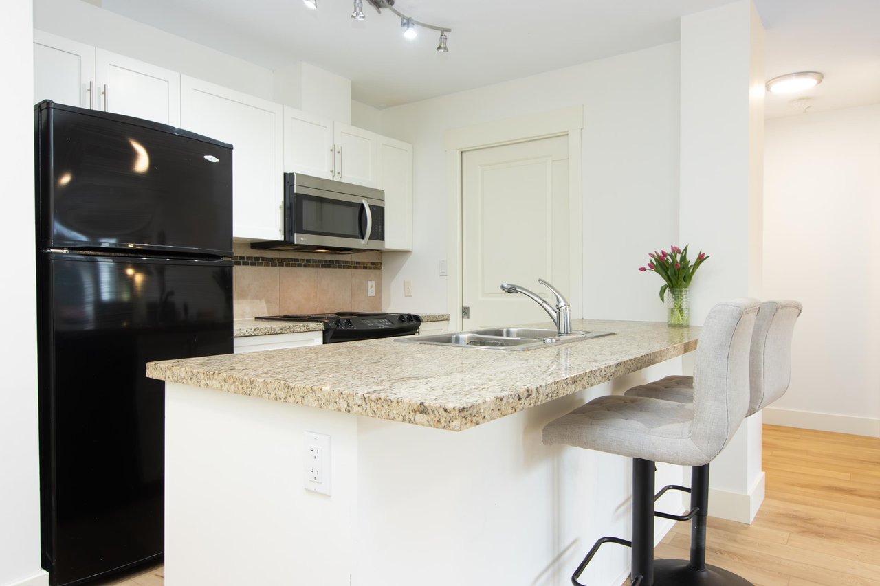 217-1211 Village Green Wy