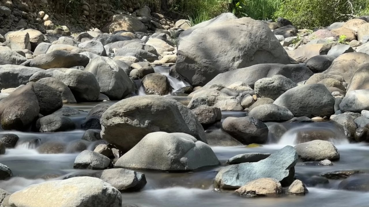 A Tranquil Haven: Prime Investment Opportunity in Uvita's Lush River Enclave