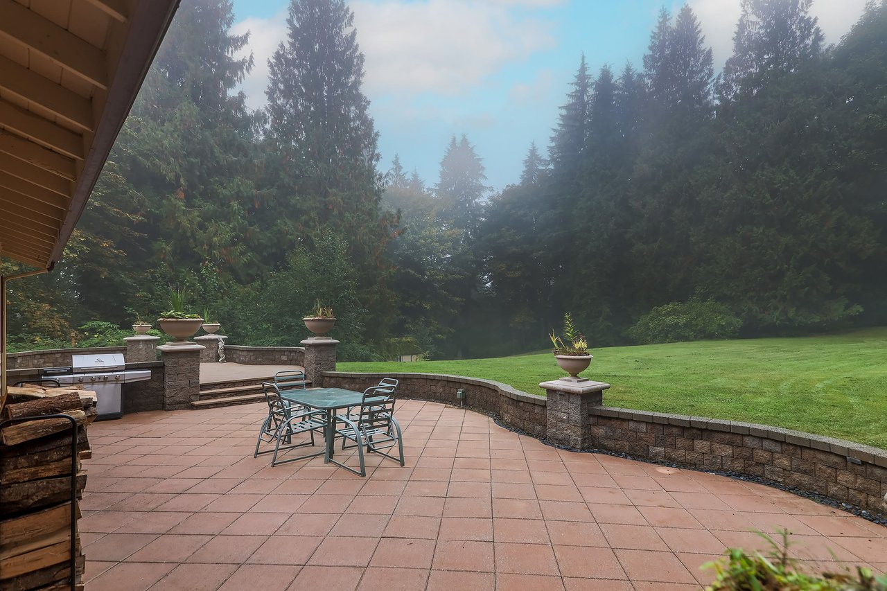 Privacy is a key feature of this property, with lush landscaping and mature trees surrounding the spacious backyard. Enjoy your time on the patio or in the yard without any prying eyes – it's your own secluded oasis.