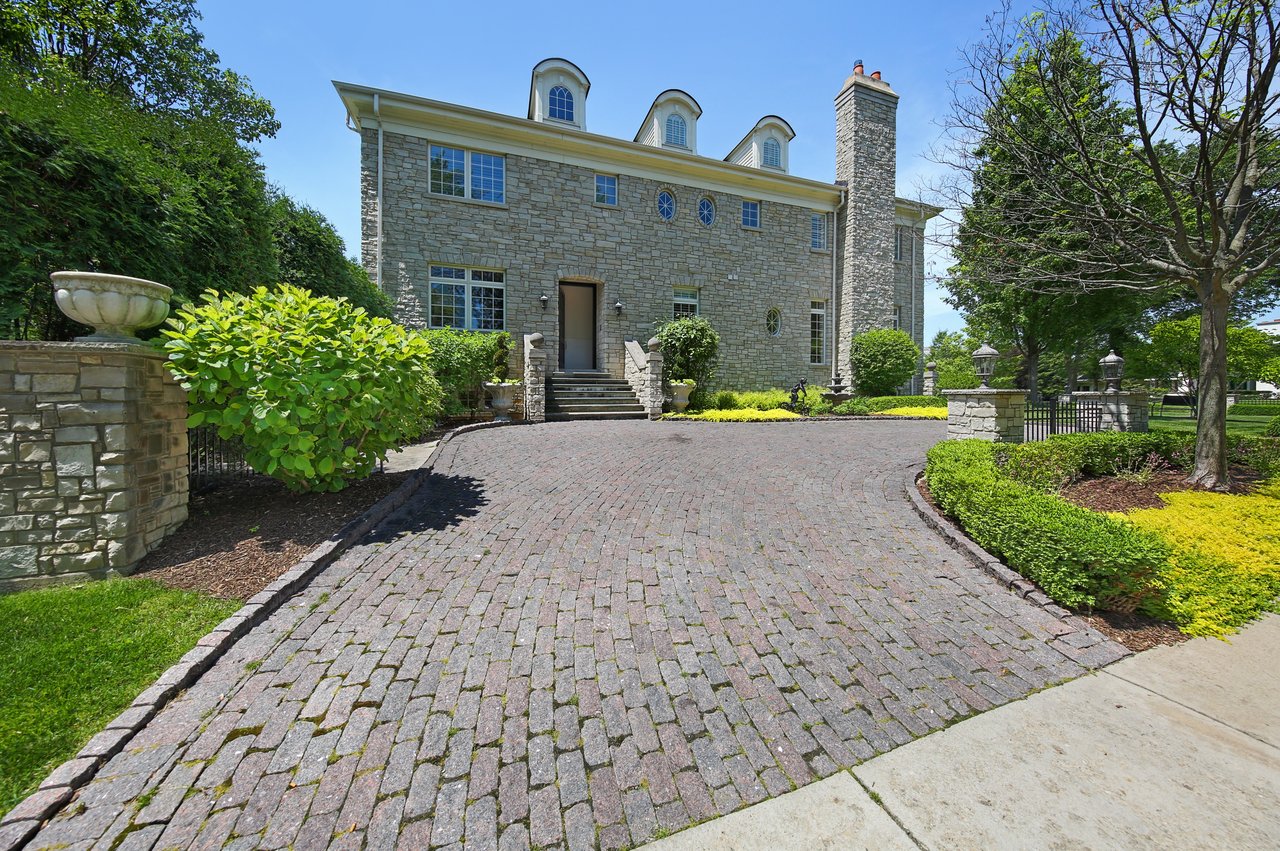 This Sophisticated Home Features A Commanding Presence 