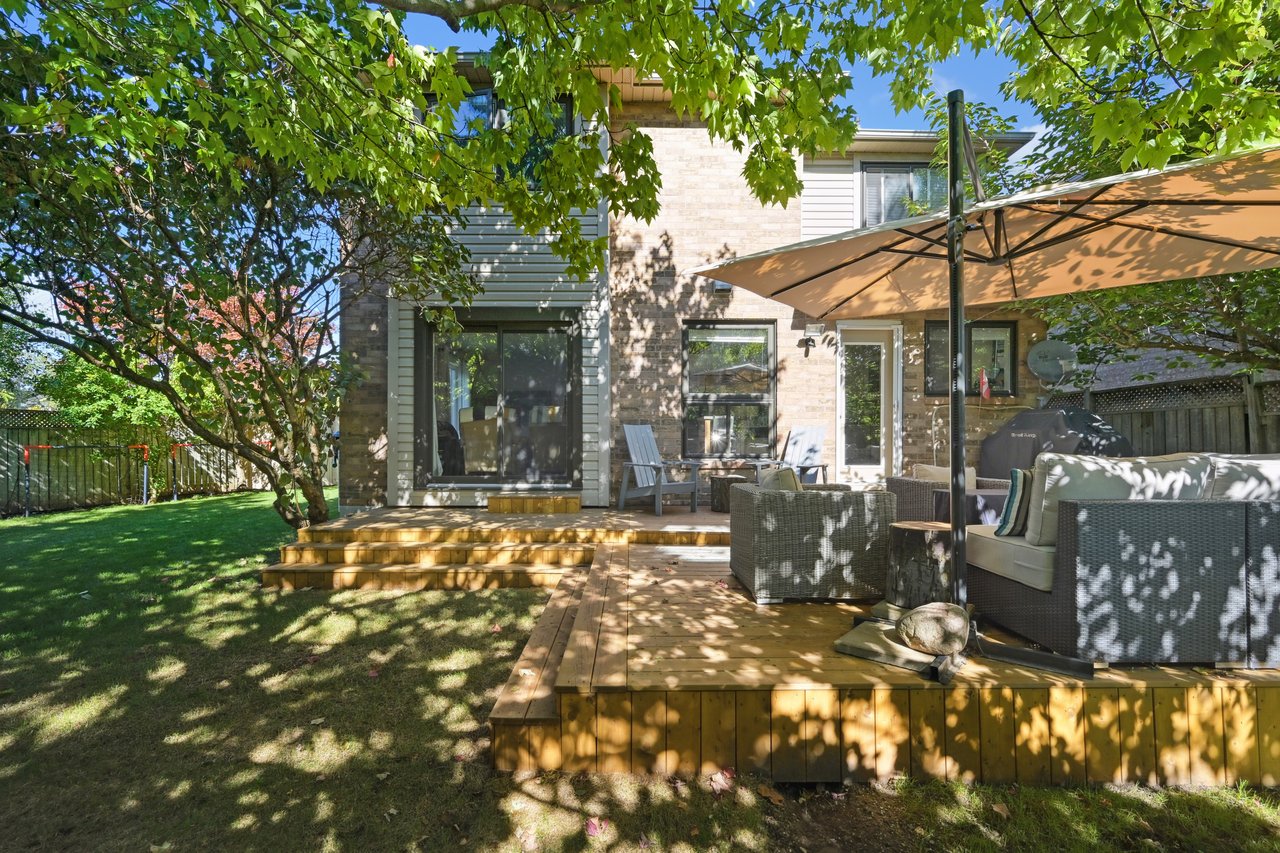 Sun-Filled Sophistication on a Rare Pie-Shaped Lot in West Oak Trails