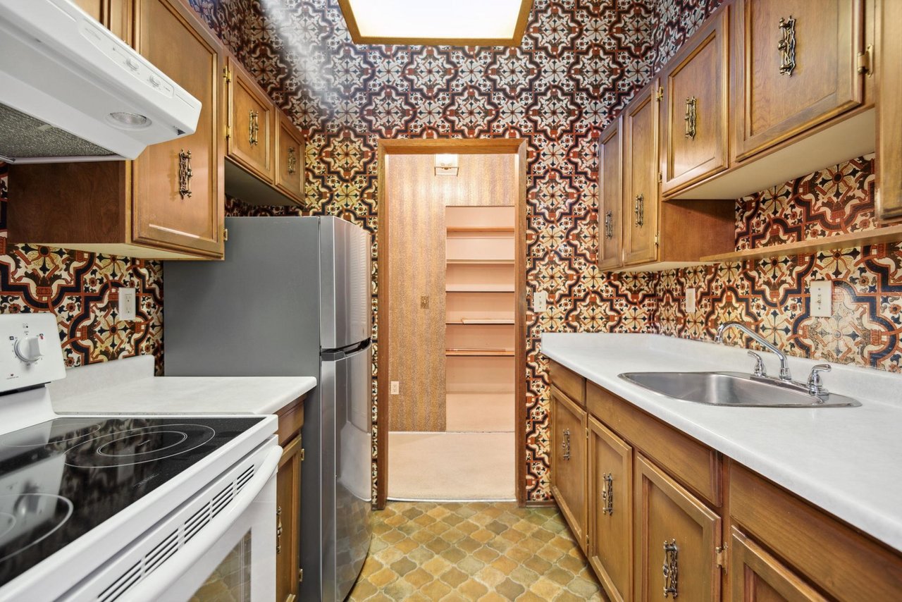 303-1266 W 13th Ave