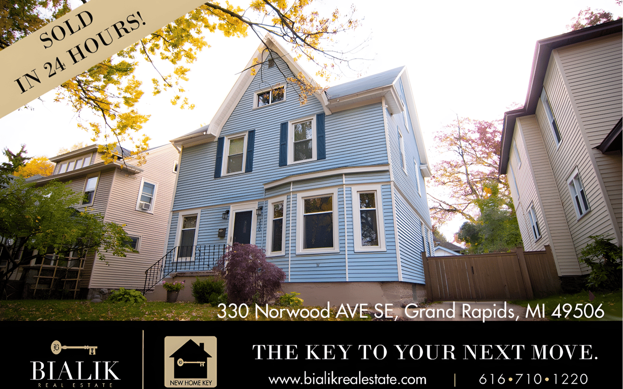 Sold-in-24-hours announcement for a blue Grand Rapids home at 330 Norwood Ave SE, with Bialik Real Estate branding.