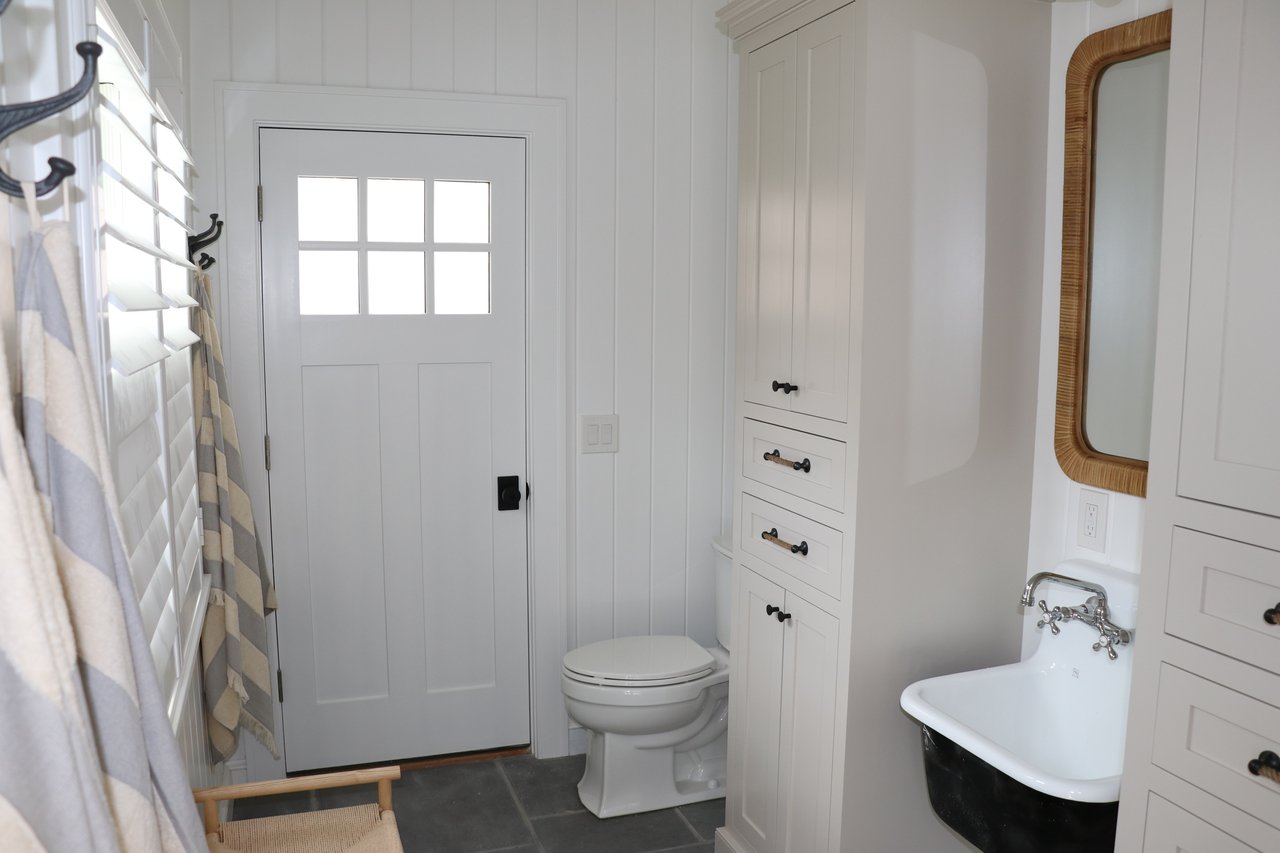 A Classic Bay Header with a Pool House