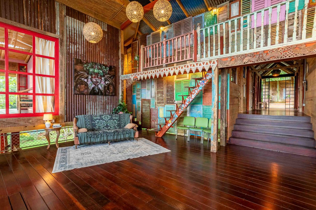 A Handcrafted Residence Immersed in Nature Above the Canopy Ocean View Architectural Home