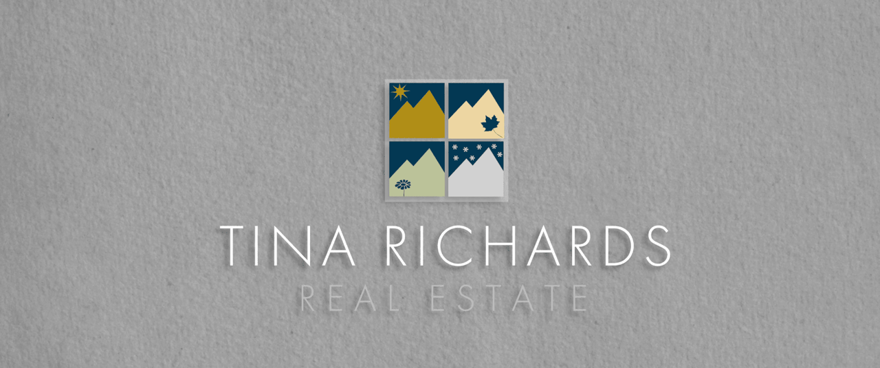  A real estate logo for "Tina Richards Real Estate" featuring a stylized window icon above the text. 