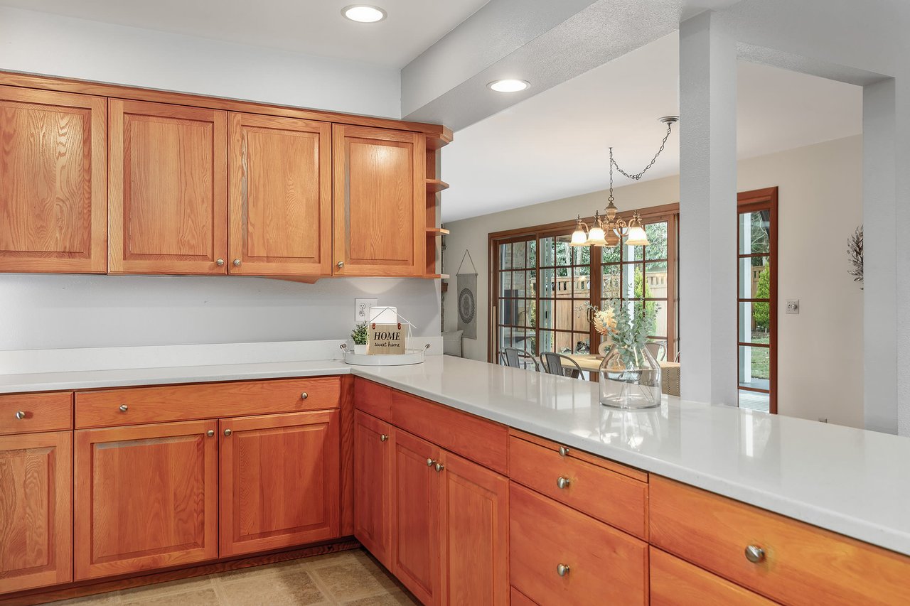 Embrace a sleek design aesthetic with clean lines and an abundance of kitchen cabinets, offering both style and ample storage for your culinary needs.