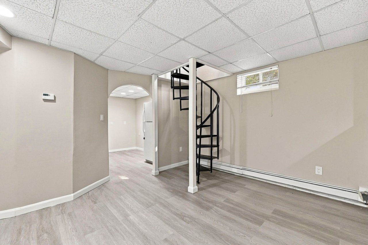 A Rare Two-Family Generational Asset with a Private Entrance to the Arnold Arboretum